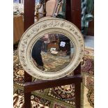 A Vintage convex framed mirror. [37cm diameter]