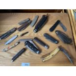 A Quantity of antique and vintage pocket knives which includes various dockyard knives.