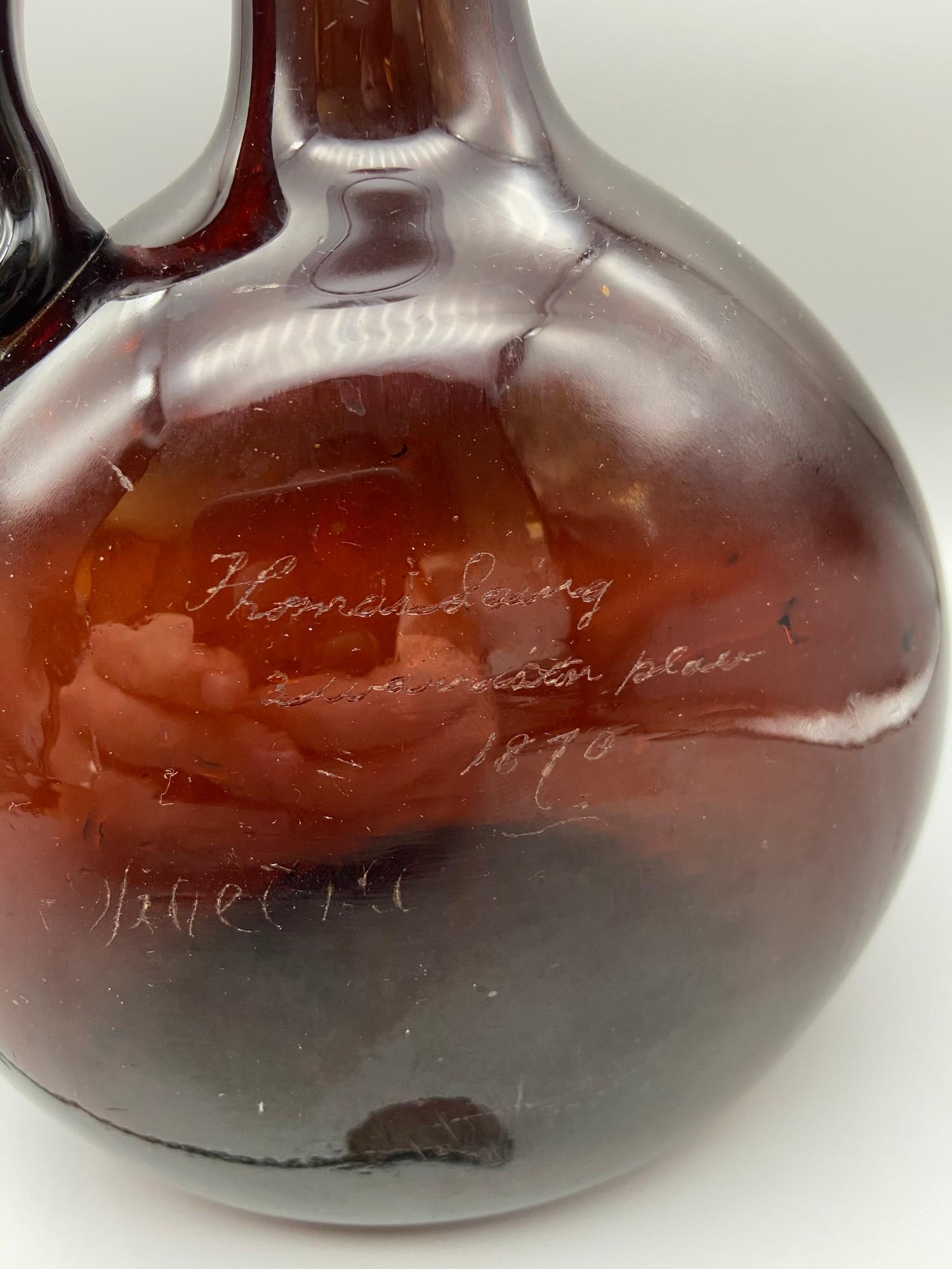 A Victorian brown glass whisky flagon designed with a possible silver collar, Also comes with a - Image 2 of 7