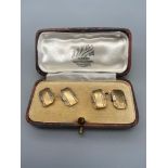 A Pair of Stylish 9ct gold art deco design cuff links together with original display box. [9.