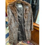 A Vintage ladies fur long coat. Produced by A.E.Ball Edinburgh.