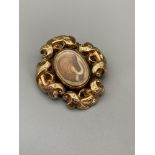 Antique Victorian Mourning brooch, No marking possibly 9ct gold. Ornately engraved with flowers.