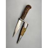 Antique sgian dubh with antler handle & plated mounts. Leather needs replacing.