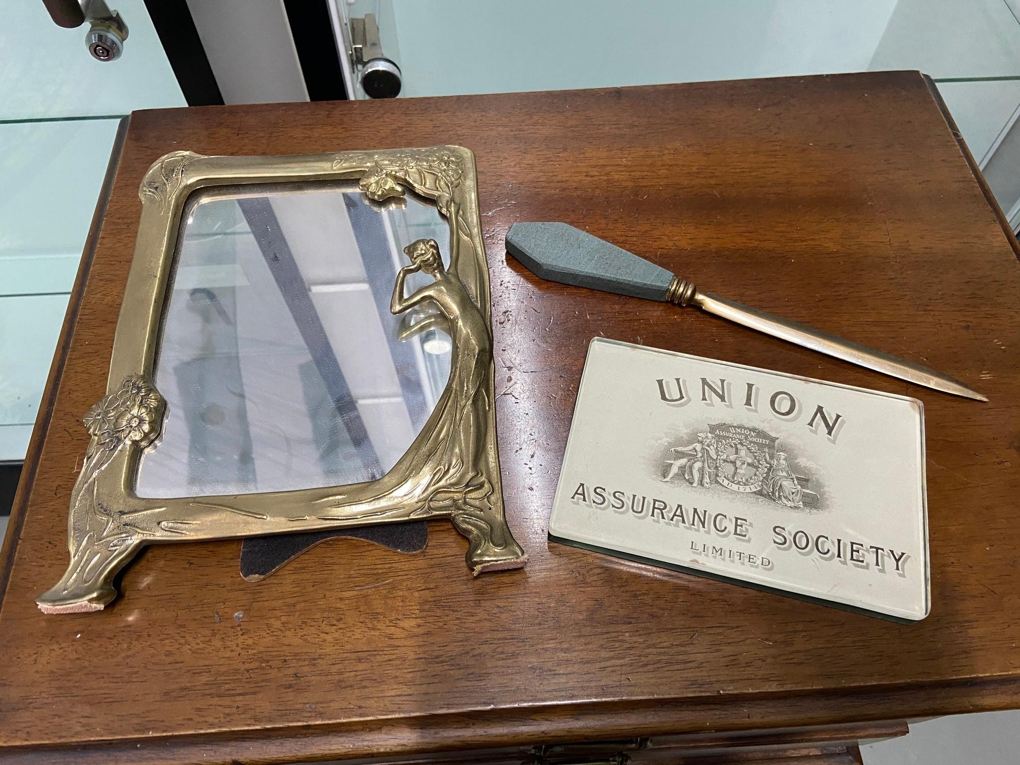 A Vintage Union Assurance Society Limited paper weight, Slate and bronze letter opener and An Art