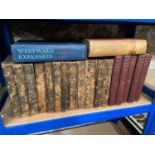 A Shelf of antique books which includes the complete 12 volume set of The History of the Decline and