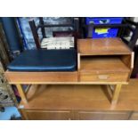 A Retro teak pedestal telephone table with black cushioned seat. [53x100x40cm]