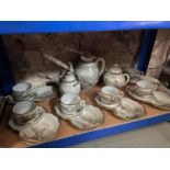 A Shelf containing a Japanese Satsuma tea set