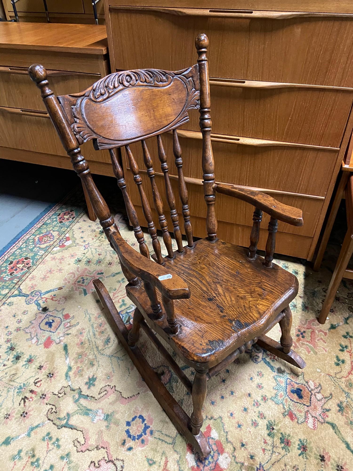 An American child's rocking arm chair.