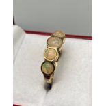 A Ladies 925 gilt silver ring set with 5 large opal style stones. [Ring size Q]