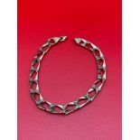 A Gent's 9ct gold link bracelet designed with diamonds [22cm length][15.38 Grams][Hoop damaged &