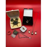 A Quantity of silver and costume jewellery. Includes Sterling silver bracelet with preying hand
