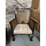 Antique Bergere sides and back tub chair. Designed with ball and claw feet.