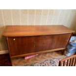 A Mid century Vanson pedestal sideboard designed with three drawers and two doors.