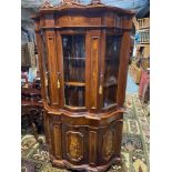 An Impressive reproduction bow front display cabinet, Designed with ornate inlay panels, Bow glass
