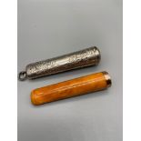 An Ornate Birmingham silver cheroot holder together with a Butterscotch amber cheroot with a 9ct