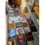 A collection of mixed genre LP Records to include AC/DC, THE POLICE, RAINBOW, WHITRSNAKES, MDC,