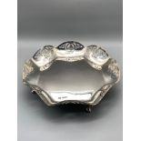 A Sheffield silver pierced scalloped edge bowl/dish supported on four feet. Produced by Viners Ltd