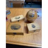 Four items of Mauchline ware to include wool bobbin and three storage boxes.