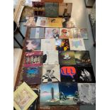 A Large collection of mixed genre LP Records to include Yes,T-REX, FLEETWOOD MAC, JOHNNY CASH,