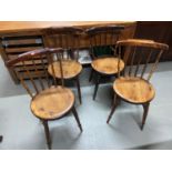 A Set of four antique Victorian penny spindle back chairs.