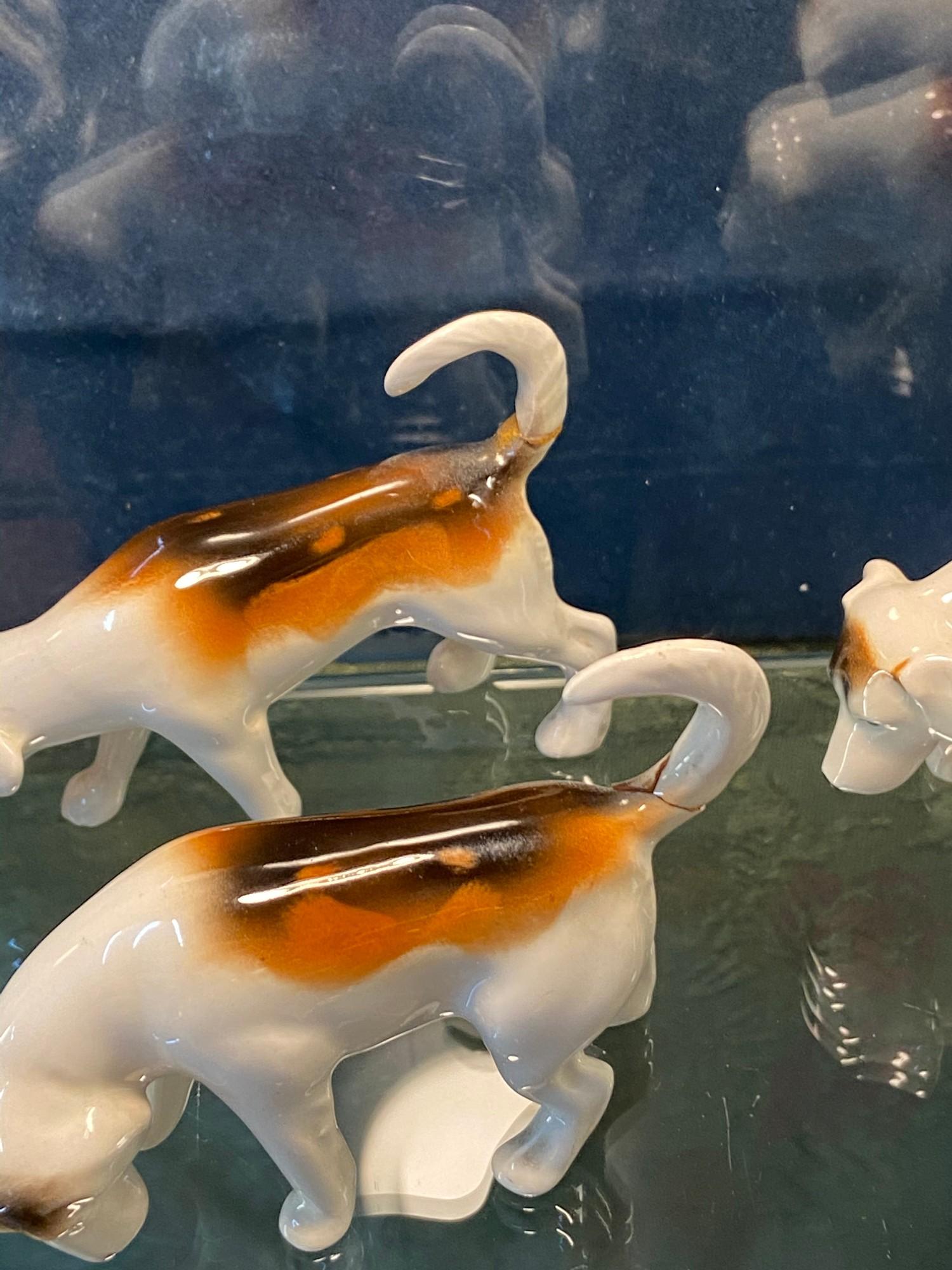 A Shelf of Beswick animals which includes Fox, bugle hunting dogs and sheep. - Image 3 of 3