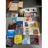 A Box containing a mixed genre of records to include Billie Holiday, The Drifters, Ramones, UB40,