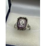 A Lovely example of a ladies 18ct white gold Art Deco ring. Designed with a single Amethyst