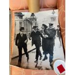 A Vintage large blown up photograph of a suffragette getting taken away by the police.