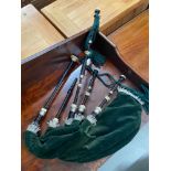 A Set of bagpipes produced by Drumran Scotland. Designed from ebony and white metal mounts