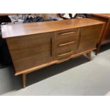 A Mid century pedestal sideboard produced by Hunters of Derby