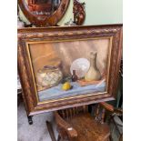 Antique oil painting on canvas of still life. Fitted with a dark wood frame.