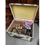 A Small travel trunk containing various collectables to include two small bronze preserve pots,