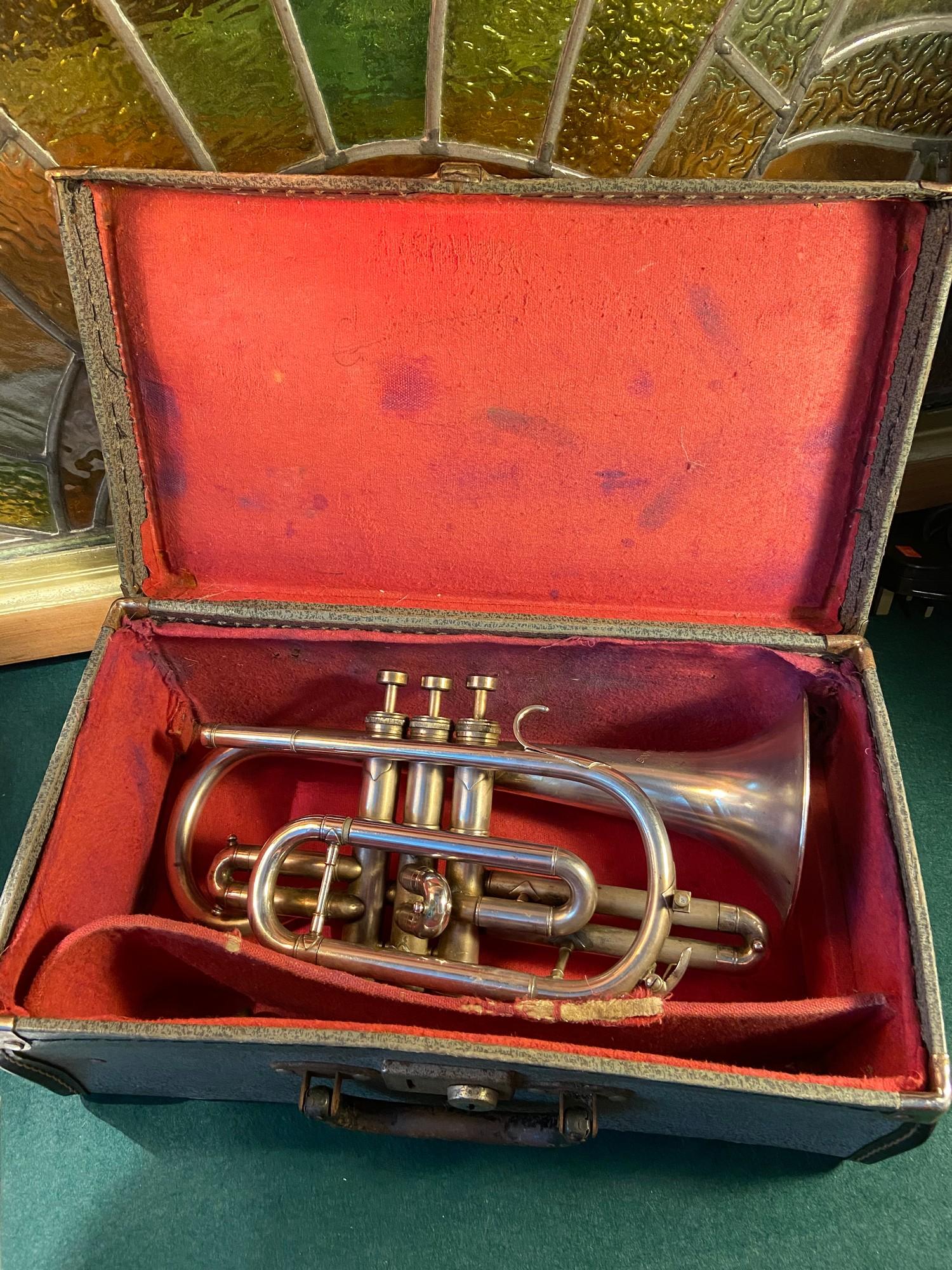 A Vintage Boosey & Hawkes 'Regent' trumpet with carry case.