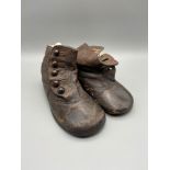 A Pair of Victorian Children's leather shoes.