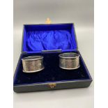 A Boxed set of two Chester silver napkin rings.