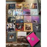 A Large collection of mixed genre records to include EAGLES, ABBA, THE MOODY BLUES, SIMPLE MINDS,