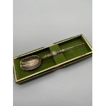 A Sheffield silver Anointing tea spoon with fitted box.