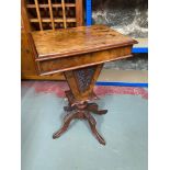 A Beautiful example of a Victorian sewing table, Ornately carved legs and panels. Designed with