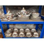 Two shelves of Mason's 'Brown Velvet' dinner service