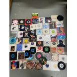 A Pile of 45R.P.M Records includes IRON MAIDEN, VARIOUS PICTURE DISCS, FRANKIE GOES TO HOLLYWOOD,