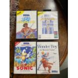 A Lot of four vintage boxed Sega games, Sonic, Wonder Boy, Golden Axe and Speedball.