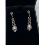 A pair of silver, Marcasite and Opal paneled drop earrings