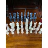 Egyptian style hardstone chess pieces.