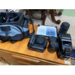 Centon camera bag containing a Canon E0S-1 N Camera, Sigma DL ZOOM, Two canon lens and flash.