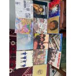 A Lot of Beatles and John Lennon LP Records.