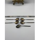 A set of 5 Danish silver and enamel tea spoons produced by Horsens Solvvarefabrik/ W.&.S. Sorensen.