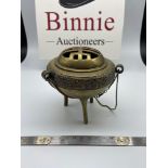 A 19th century Bronze/ Brass censor burning pot with lid. Designed on three pedestal legs. [10cm