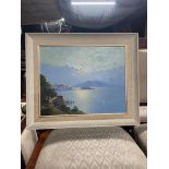 A Large oil painting on board depicting land and ocean scene signed by the artist. Together with a