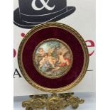A Regency miniature painting of children playing with birds. Signed D' Boucher. Fitted with a