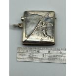 A Sterling silver vesta case with embossed Golfer Image. [3.4x3.5cm]